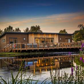 a lodge on the waterfront at night