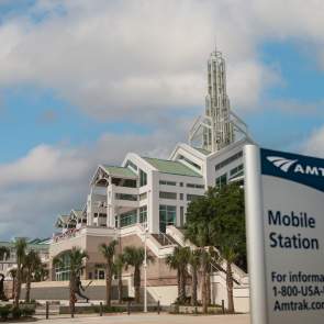 Photo of Amtrak Mobile Station sign outside of Arthur R. Outlaw Mobile Convention Center