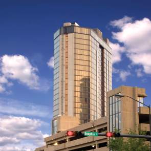 high rise hotel and parking garage