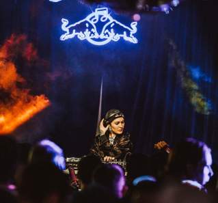 DJ on stage with Thank You For Sweating in Austin Texas