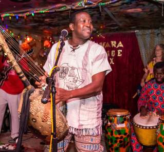 Ibrahim Aminou with band Zoumountchi performing at Sahara Lounge in Austin Texas