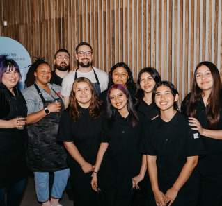 Austin chef mentors with Travis High School PTECH Hospitality students at Give Back Gig 2024.