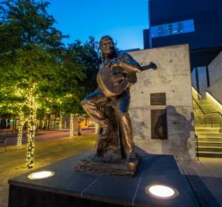 Willie Nelson Statue at ACL Live at the Moody Theater in the 2ND Street District in austin texas
