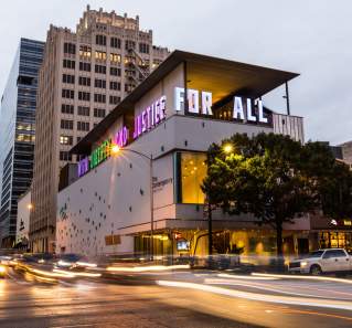 The Contemporary Austin Jones Center With Liberty And Justice For All exterior display