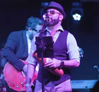 Grupo Fantasma band on stage in austin texas