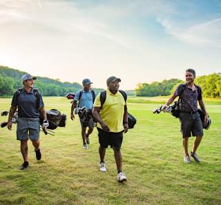 group of men on a golf course