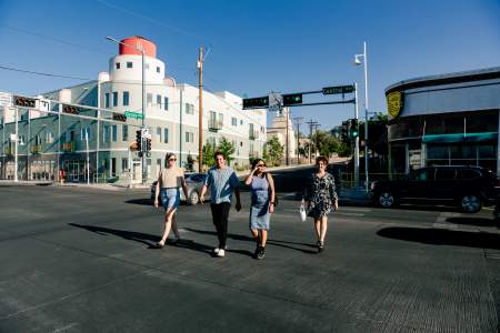 Four people cross Central at Carlisle in Nob Hill.