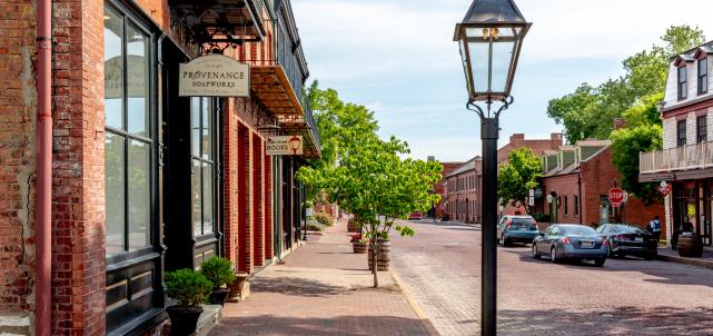 The road, sidewalks, and buildings are all made of brick in Historic Main Street in St. Charles, MO