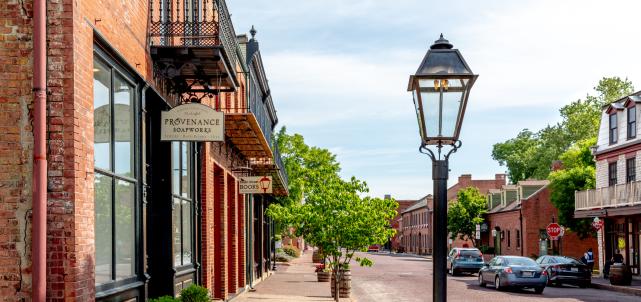 The road, sidewalks, and buildings are all made of brick in Historic Main Street in St. Charles, MO