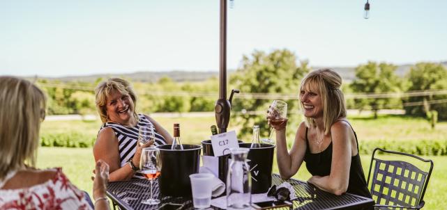 Women eating on terrace of Defiance Ridge Vineyards