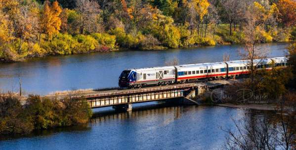 Amtrack Train crossing Huron River in Fall