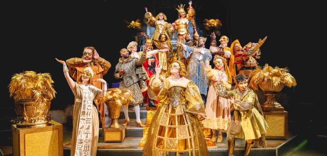 actors in costume on a stage