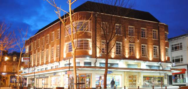 Lancaster Building lit up at dusk