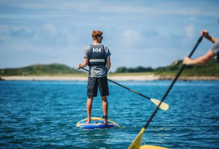 Paddleboarding teenagers
