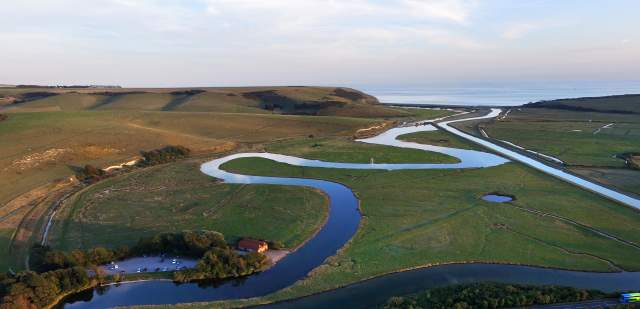 Aerial landscape of Cuckmere Haven river towards the Sussex coast