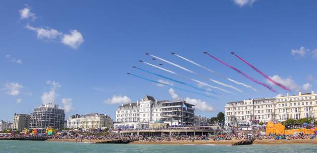 Red arrow display over the seafront at Eastbourne Air Show