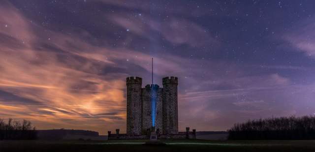 Castle silhoutted against twilight sky in Sussex