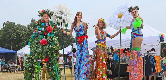 Stilt walkers at Hippie Fest