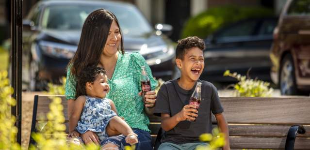 Family drinking Cheerwine at Bell Tower Green