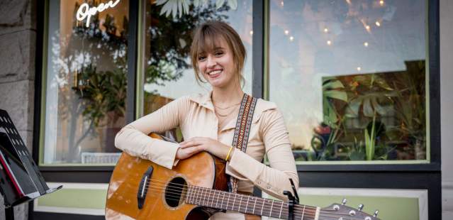 Girl with guitar in Downtown Salisbury