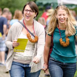 Two smiling women at Beer Festival