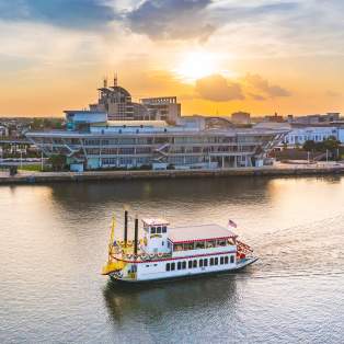 Paddlewheel boat on Mobile River in front of the National Maritime Museum.