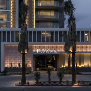 Exterior of the Kimpton Rowan Palm Springs hotel at night