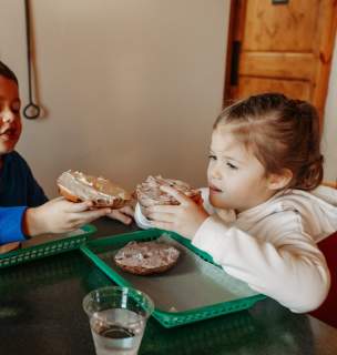 kids enjoying a bagel breakfast at black hills bagels in rapid city, sd