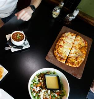 food spread from downtown rapid city, sd restaurant independent ale house  on table