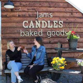 two women enjoying locally made ice cream at White Clover Farm