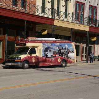 grapevine visitors shuttle parked on main street