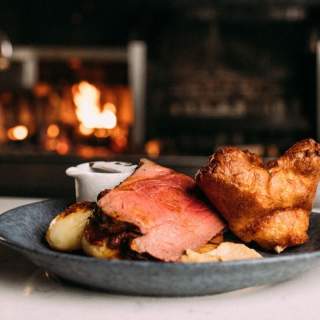 A plated Sunday roast from Taylor & Clay Grill.