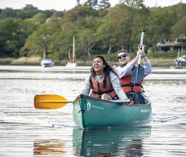 Two people canoeing on Beaulieu River with New Forest Activities - Things to Do Feature