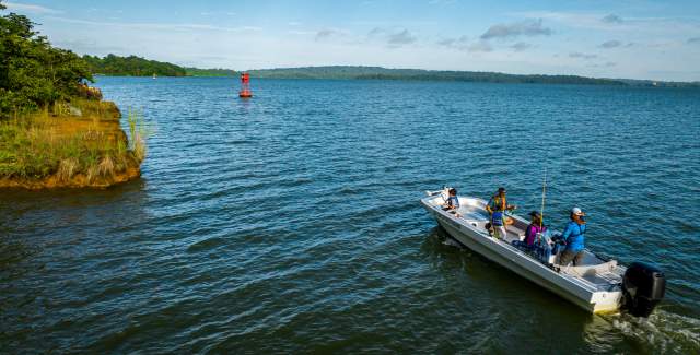 Group boating at Gatun Lake on a sunny day