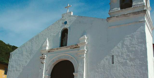 view of the white facade of St. Peter's Church on Taboga Island