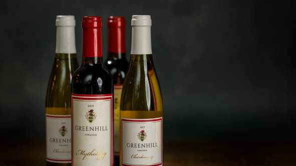 Bottles of Greenhill Vineyards wine including Mythology red and Chardonnay varietals made in Middleburg, Virginia
