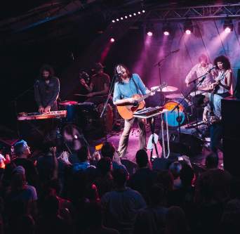 band on stage at the mohawk during Hot Luck Live Food and Music Fest in austin texas
