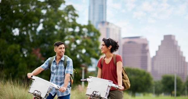pair biking on the Butler Hike and Bike Trail in downtown austin texas