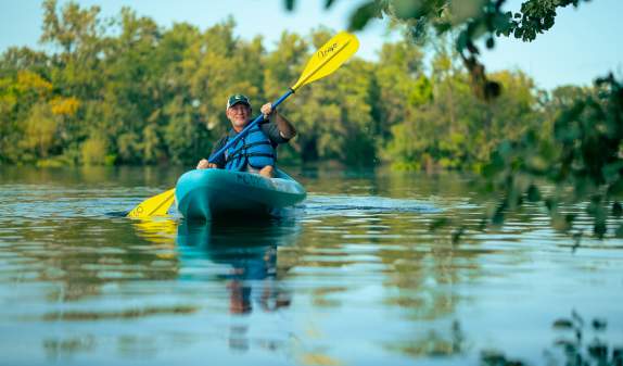 Man kayaking on Huron River