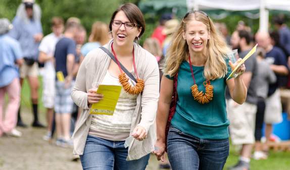 Two smiling women at Beer Festival