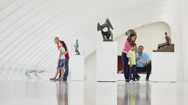 Familes looking around the Milwaukee Art Museum
