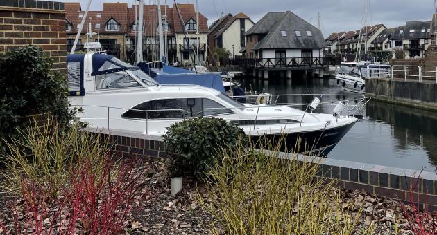 Boats moored up at Hythe Marina in the New Forest