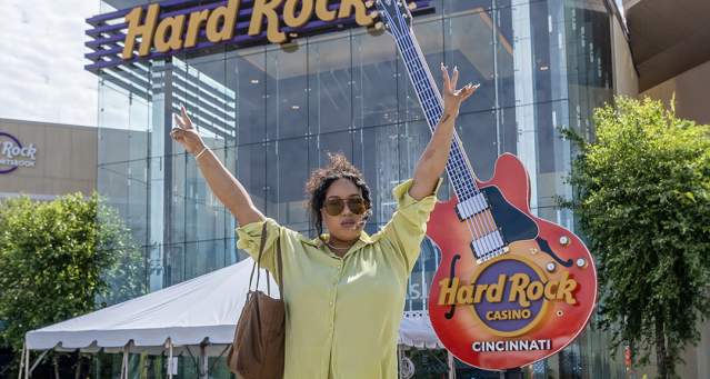 Influencer standing outside Hard Rock in Cincinnati