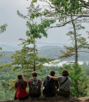 Group of friends on the summit of Stewart Mountain