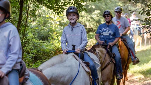 Child horseback riding at Shelby Trails