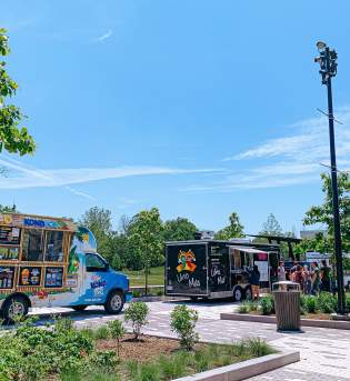 Food trucks lined up at Switchyard Park for Food Truck Friday