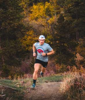 David Kerr trail running on the bridle trail on casper mountain