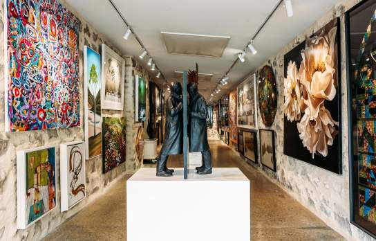 Interior shot with eclectic art at Art Bay Gallery