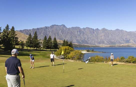 Group of friends playing at Queenstown Golf Club
