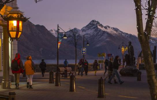 Queenstown Mall in Winter with snow dusted mountains in the background